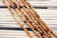 Rare & beautiful Australian Fossil Peanut Wood 5-6.5mm round beads (ETB00986)