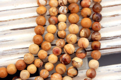 Rare & beautiful Australian Fossil Peanut Wood 5-6.5mm round beads (ETB00986)