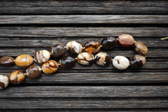 Rare & beautiful Australian Fossil Peanut Wood 13-15mm oval beads (ETB00593)