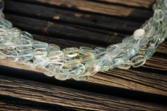 Aquamarine 5-6mm oval flat beads (ETB00702)