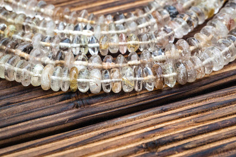 Rutilated Quartz (Brazil) 7.5-10.5mm rondelle beads (ETB00872)