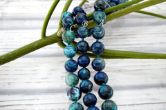 Rare and beautiful Shattuckite 12-13.5mm round beads (ETB01147)