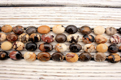 Rare & beautiful Australian Fossil Peanut Wood oval beads (ETB00026)