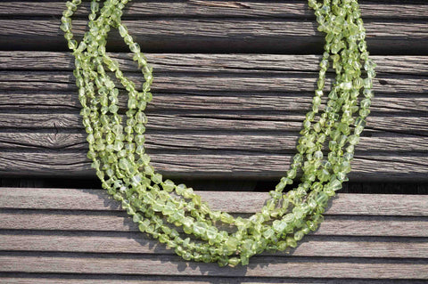 Peridot  AB grade 3-5mm faceted beads (ETB00174)