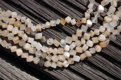 Shiny polished Moonstone 3-4mm cube beads (ETB00101)