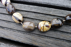 (SPL00064) Petrified Peanut Wood from Australia oval beads