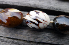 (SPL00062) Petrified Peanut Wood from Australia oval beads