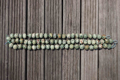 Rainforest Rhyolite (matte) 18.5-21mm rondelle beads (ETB00364)